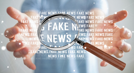Businessman on blurred background discovering fake news information 3D rendering