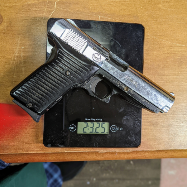 Lorcin L9 9mm pistol on scale 2.3 pounds